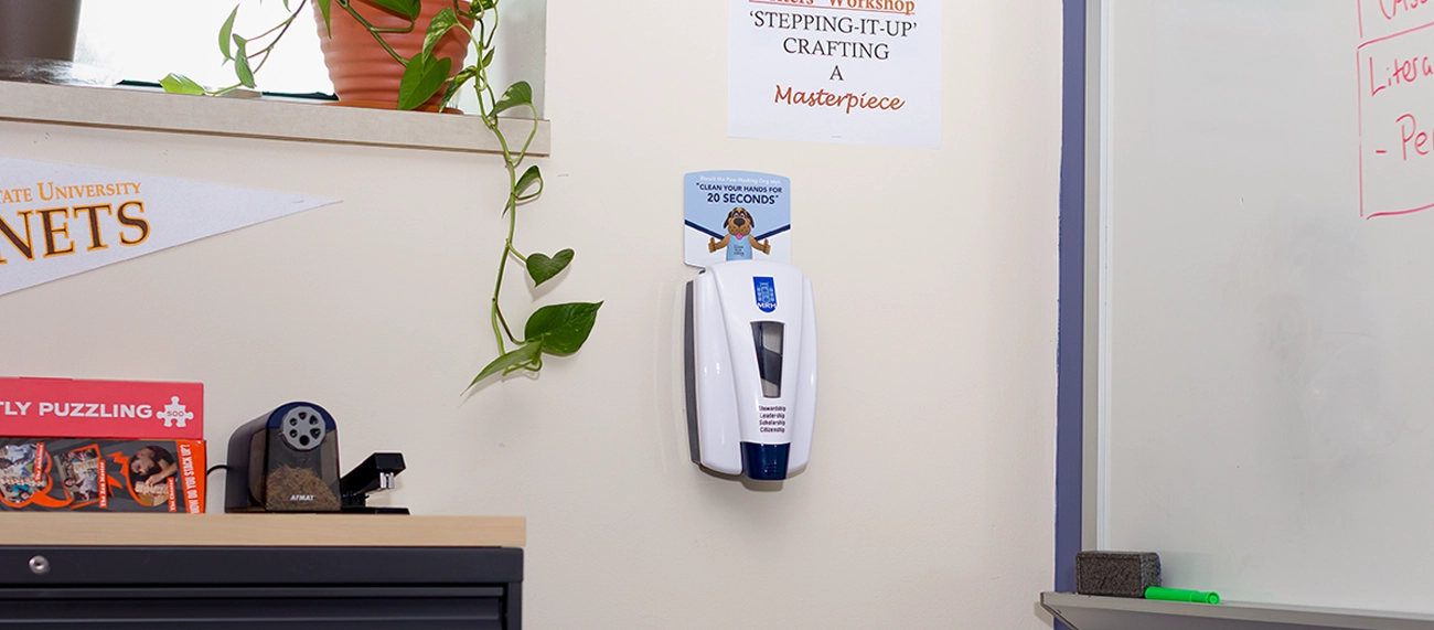 Symmetry Mavrik dispenser with BMod on a wall by school whiteboard